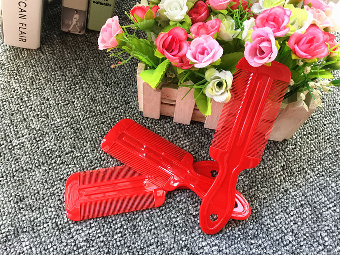 Plastic handle grate with double-sided fine tooth comb yuan store wholesale and direct commodity manufacturers Plastic handle grate with double-sided fine tooth comb yuan store wholesale and direct commodity manufacturers