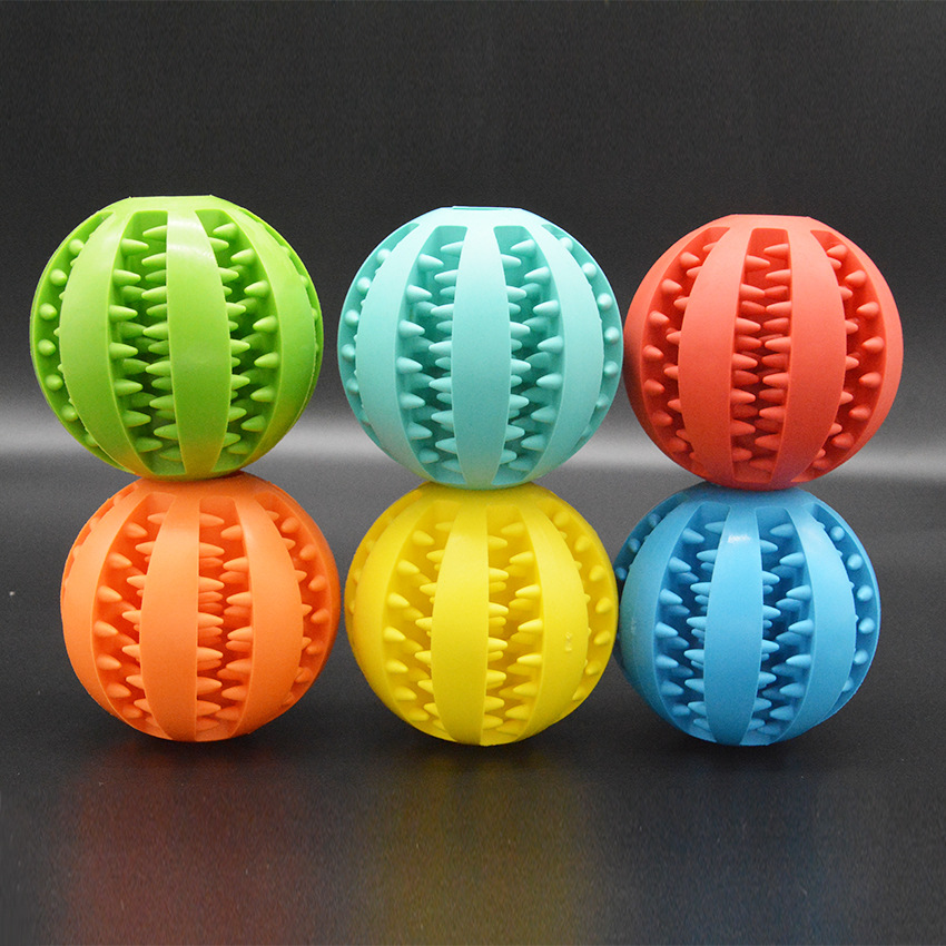 Pet Supplies Customized Molar Teeth Cleaning Food Dropping Ball Puzzle Bite Dog Toy Oval Rugby Teether Ball