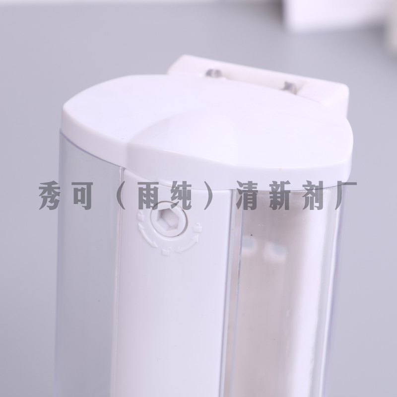 A Xiu Ke (Rain) pure freshener factory produced hand sanitizer wall - mounted transparent plastic soap dispenser