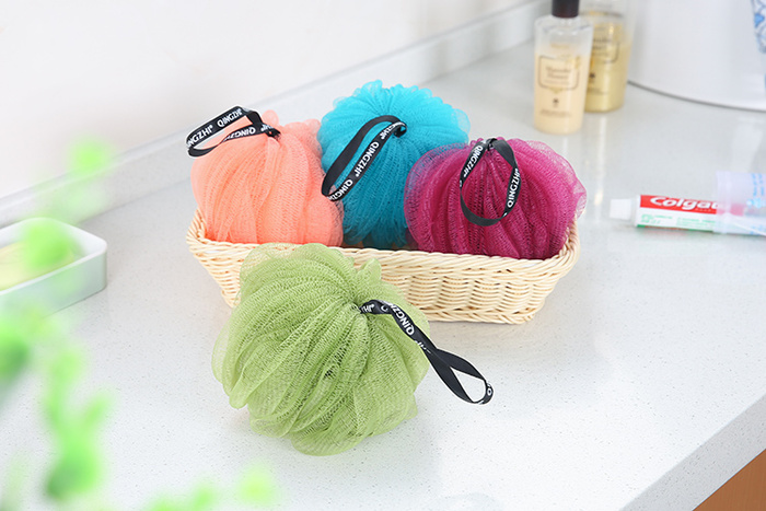 Qingzhi brand new pumpkin ball and ribbon cable professional custom bath ball bath ball.