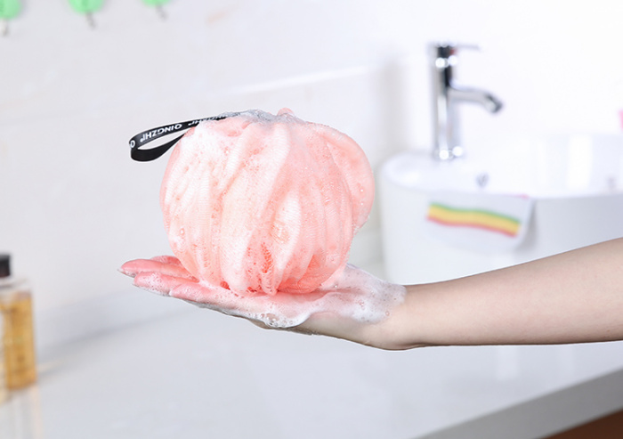 Qingzhi brand new pumpkin ball and ribbon cable professional custom bath ball bath ball.
