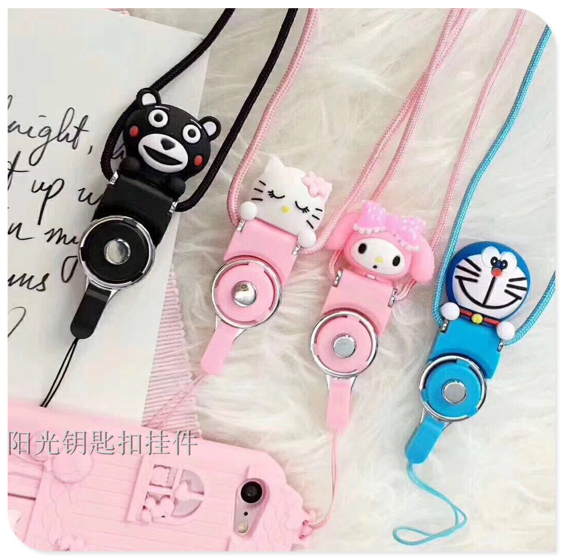 Creative two - in - one cartoon stereo childe mobile phone cord mobile phone rings hang neck rope.