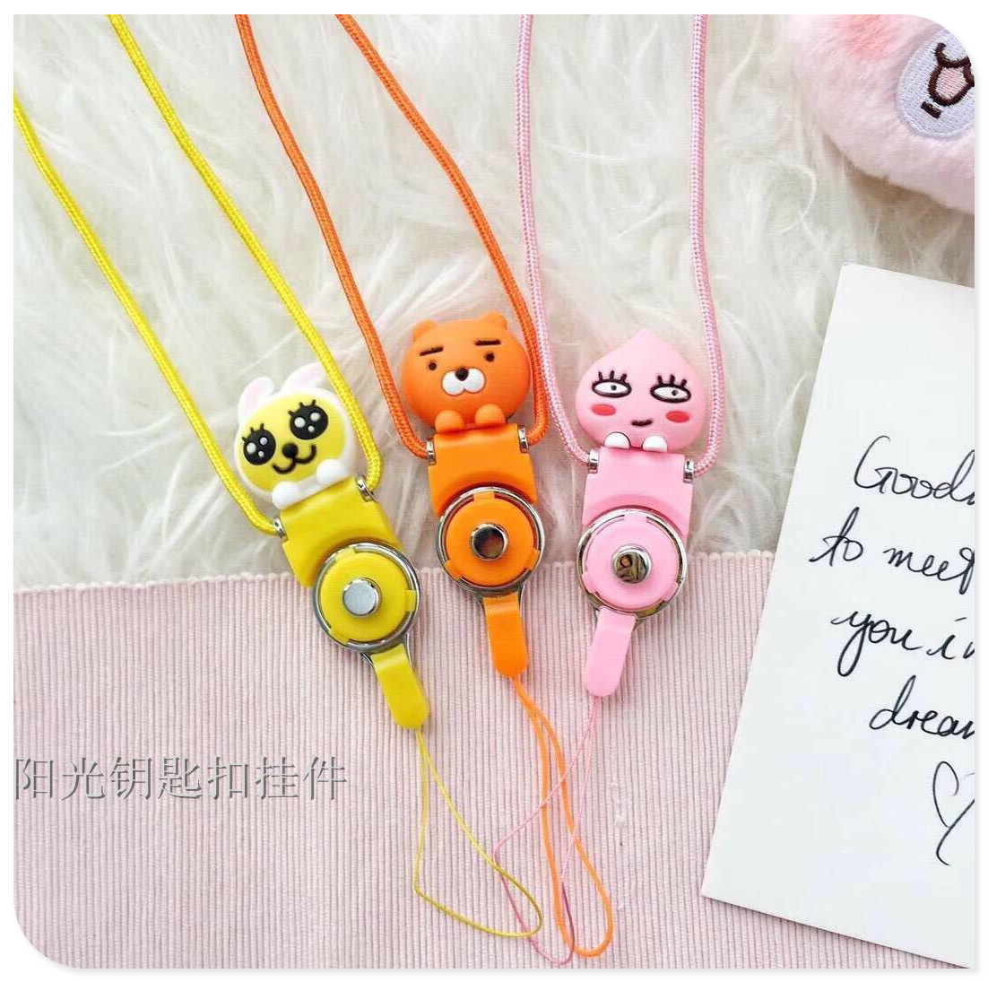 Creative two - in - one cartoon stereo childe mobile phone cord mobile phone rings hang neck rope.