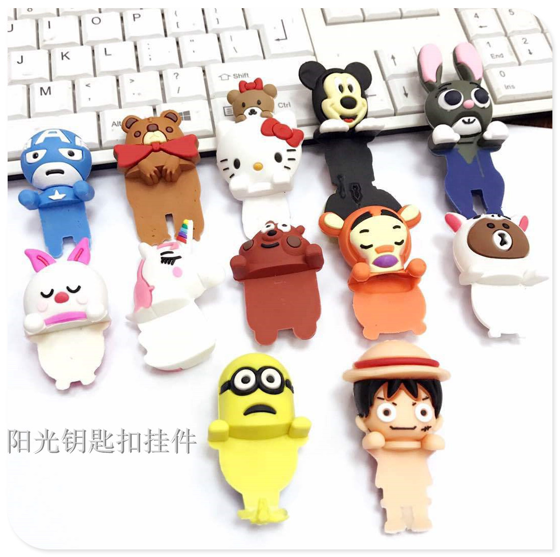 Creative two - in - one cartoon stereo childe mobile phone cord mobile phone rings hang neck rope.
