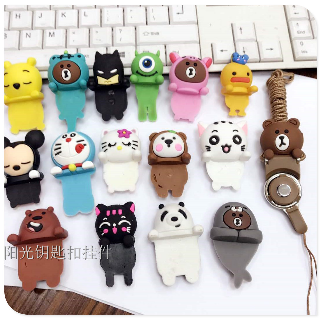 Creative two - in - one cartoon stereo childe mobile phone cord mobile phone rings hang neck rope.