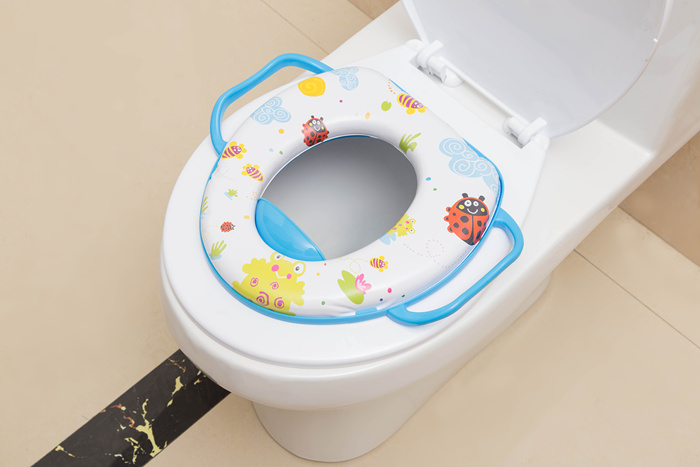Children's seat with handle children with PVC printed soft cushion seat on the toilet seat.