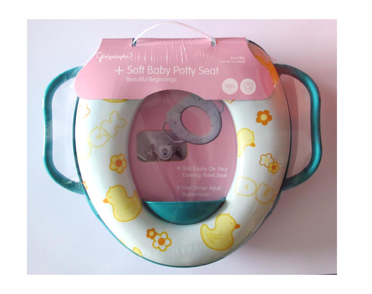 Children&#039;s seat with handle children with PVC printed soft cushion seat on the toilet seat.