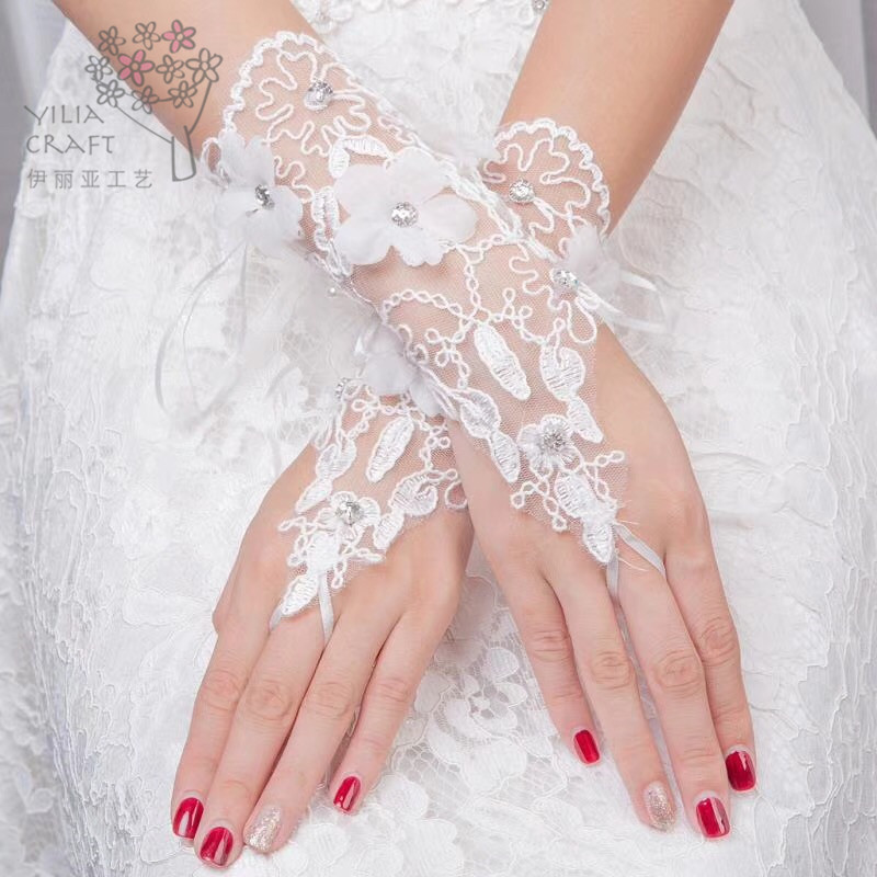 Elia Korean bride gloves wedding gown with lace embroidered mittens. Elia Korean bride gloves wedding gown with lace embroidered mittens.