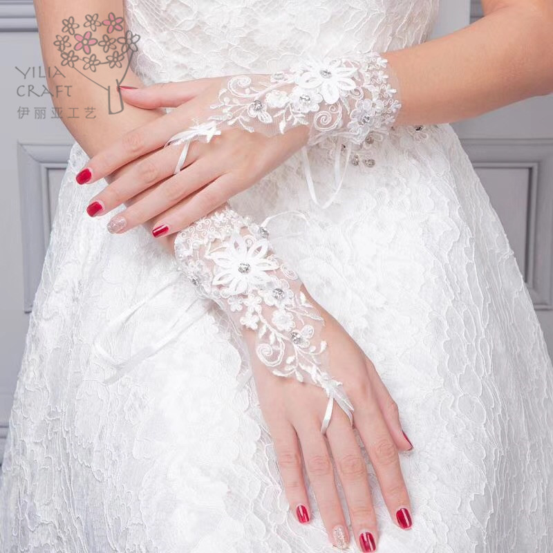 Elia Korean bride gloves wedding gown with lace embroidered mittens. Elia Korean bride gloves wedding gown with lace embroidered mittens.