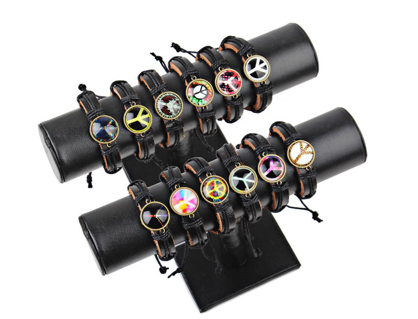 The latest European and American peace anti-war logo leather bracelet hand-woven personalized bracelet diy jewelry. The latest European and American peace anti-war logo leather bracelet hand-woven personalized bracelet diy jewelry.