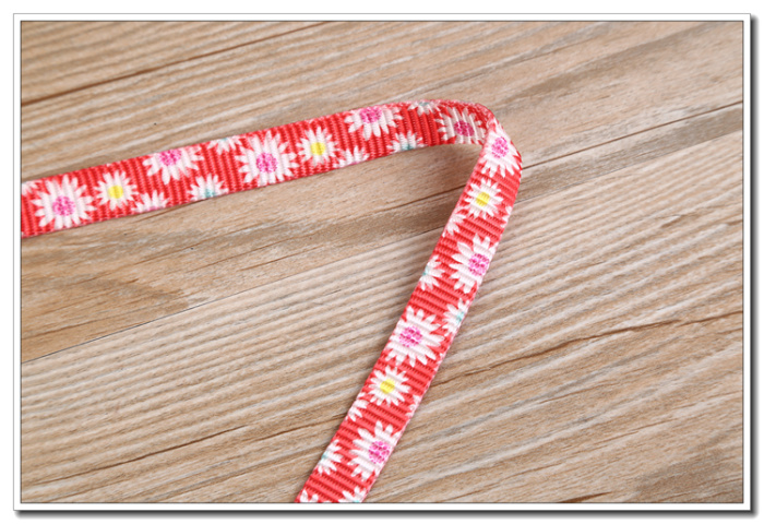 Color floret printed ribbon with pet rope hot seal chrysanthemum with double-sided printing tape manufacturer.