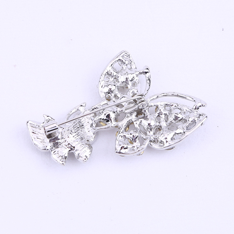 Europe and the United States cross-border supply manufacturers for Europe and the United States fashion atmosphere hollow-set diamond butterfly alloy brooch support customization