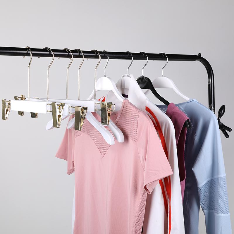 Manufacturers direct plastic Seamless imitation wooden pants rack household clothing store clothes hanging support can be close to tractable and thickened