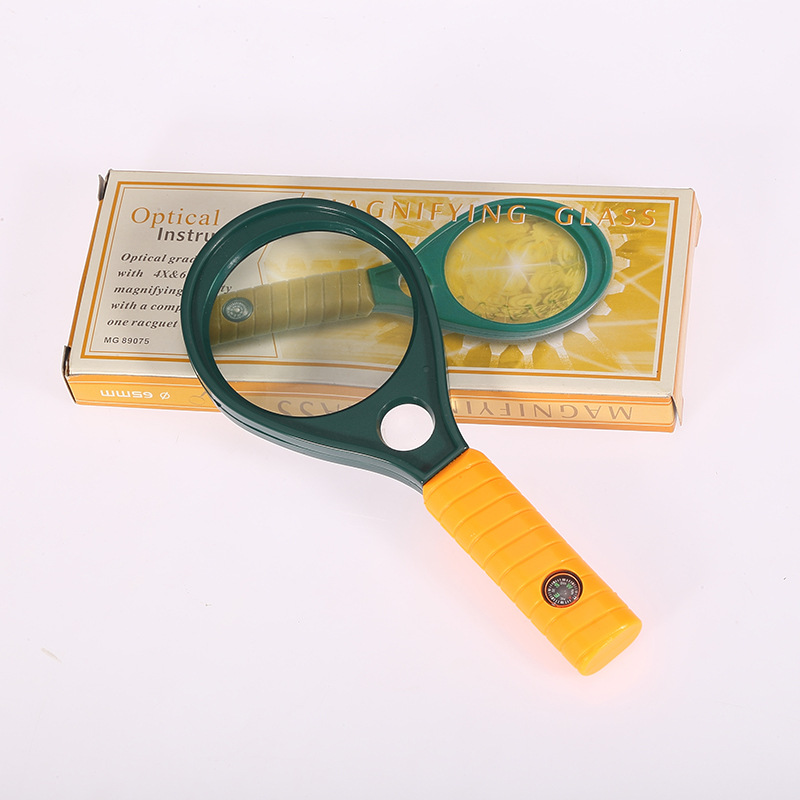 The MG89076 dual light handheld magnifying glass with a magnifying glass with a compass and reading magnifying glass.