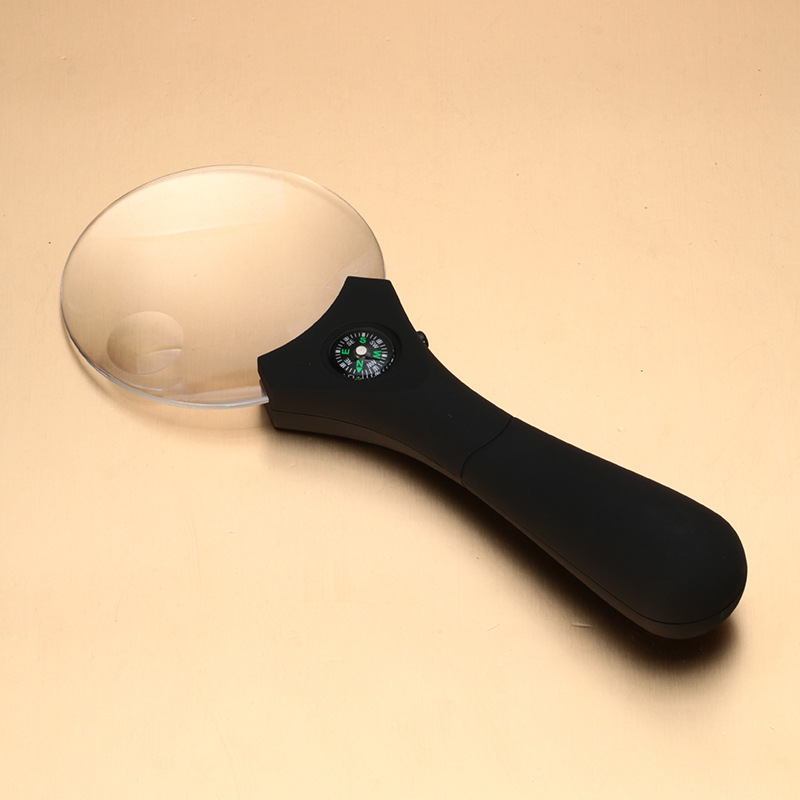 TH607 popular handheld magnifying glass with compass outdoor multi-function LED light reading magnifying glass.