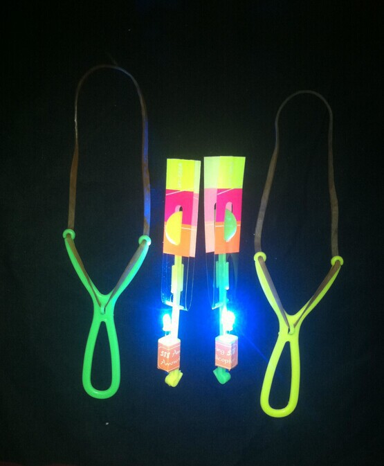 Luminous Slingshot Rocket Volume Express Blue Light Flying Sword Night Market Stall Toy Small Toy Wholesale Manufacturer