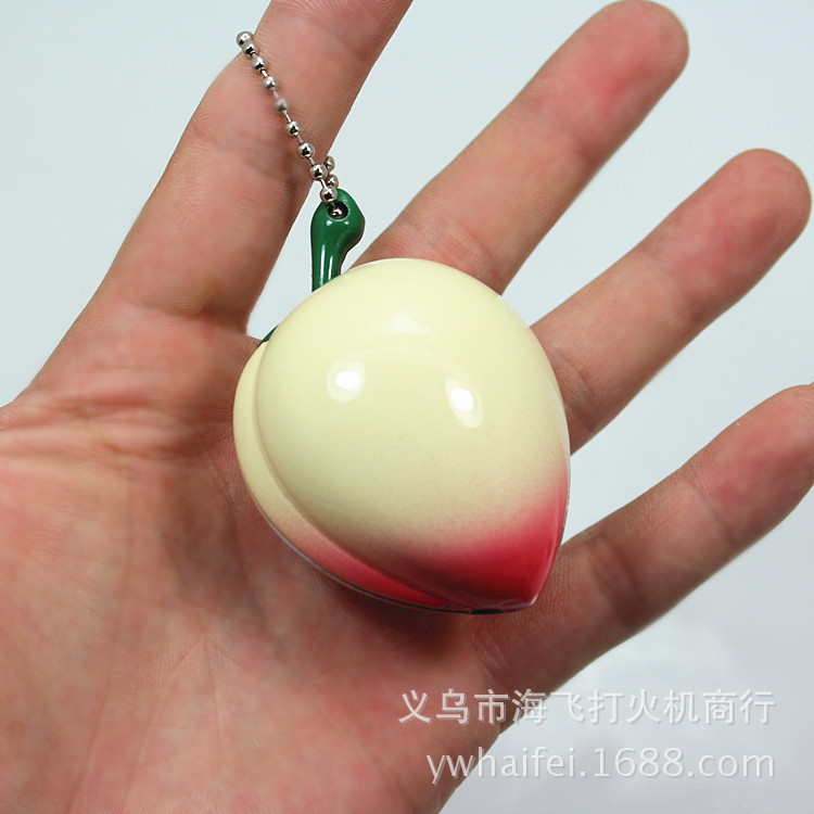 The new strange new creative flame lighter peach peach and Yanju stall goods wholesale nopostage