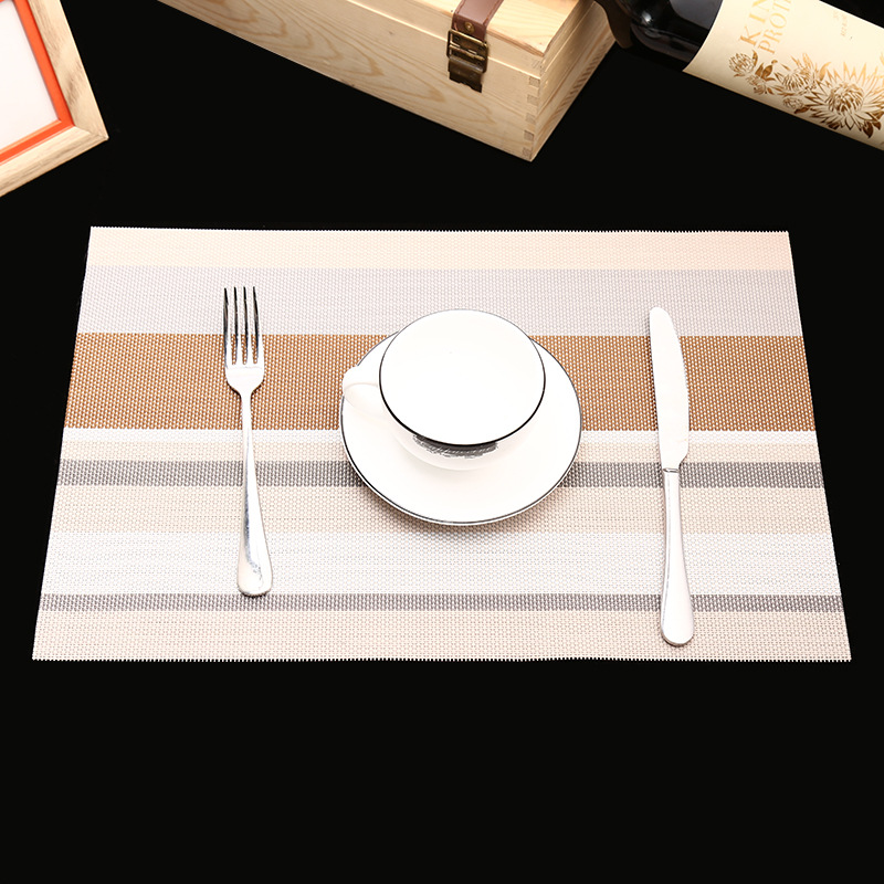 Manufacturer's direct selling hotel PVC braided heat insulation MATS for the comfort of western food pad. Manufacturer's direct selling hotel PVC braided heat insulation MATS for the comfort of western food pad.