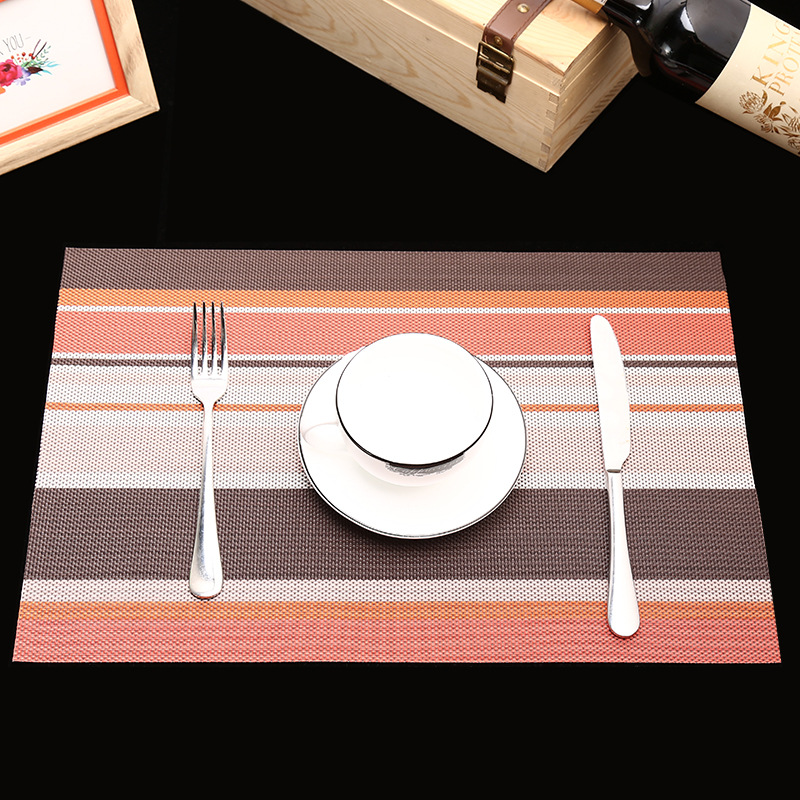 Manufacturer's direct selling hotel PVC braided heat insulation MATS for the comfort of western food pad. Manufacturer's direct selling hotel PVC braided heat insulation MATS for the comfort of western food pad.