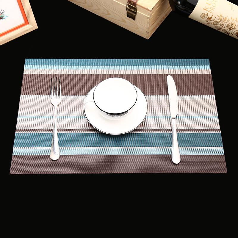 Manufacturer's direct selling hotel PVC braided heat insulation MATS for the comfort of western food pad. Manufacturer's direct selling hotel PVC braided heat insulation MATS for the comfort of western food pad.