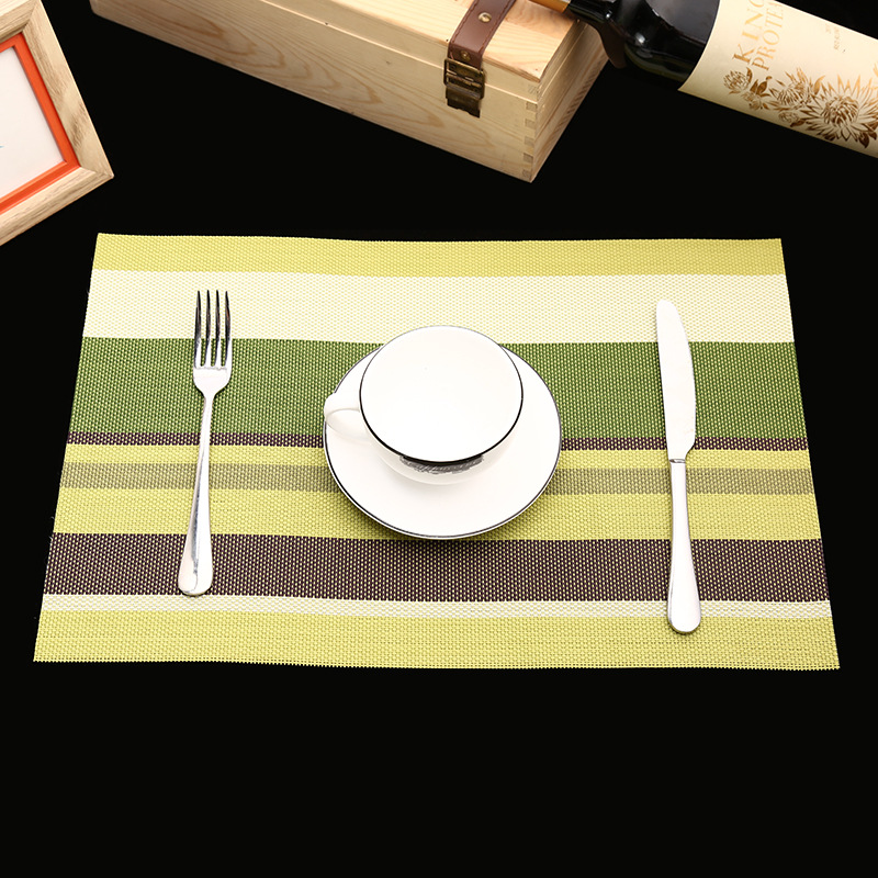 Manufacturer's direct selling hotel PVC braided heat insulation MATS for the comfort of western food pad. Manufacturer's direct selling hotel PVC braided heat insulation MATS for the comfort of western food pad.