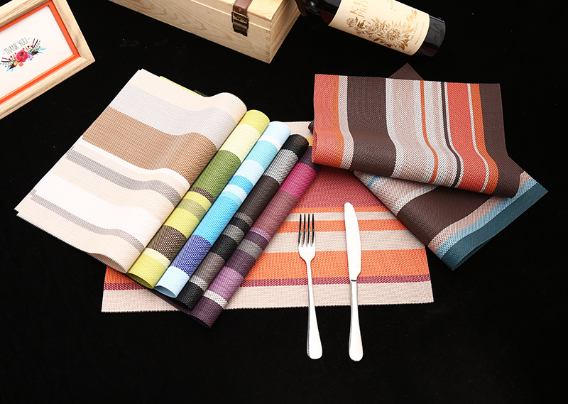 Manufacturer's direct selling hotel PVC braided heat insulation MATS for the comfort of western food pad. Manufacturer's direct selling hotel PVC braided heat insulation MATS for the comfort of western food pad.
