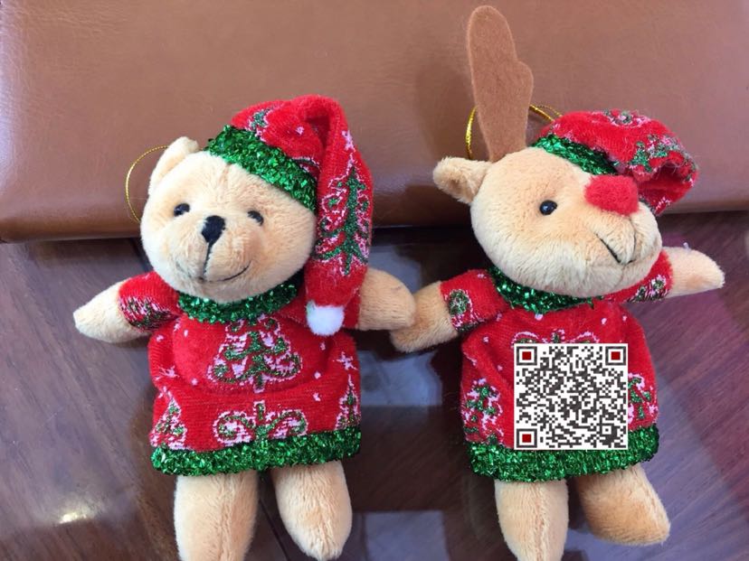 The Christmas tree is decorated with the Santa Claus bear.
