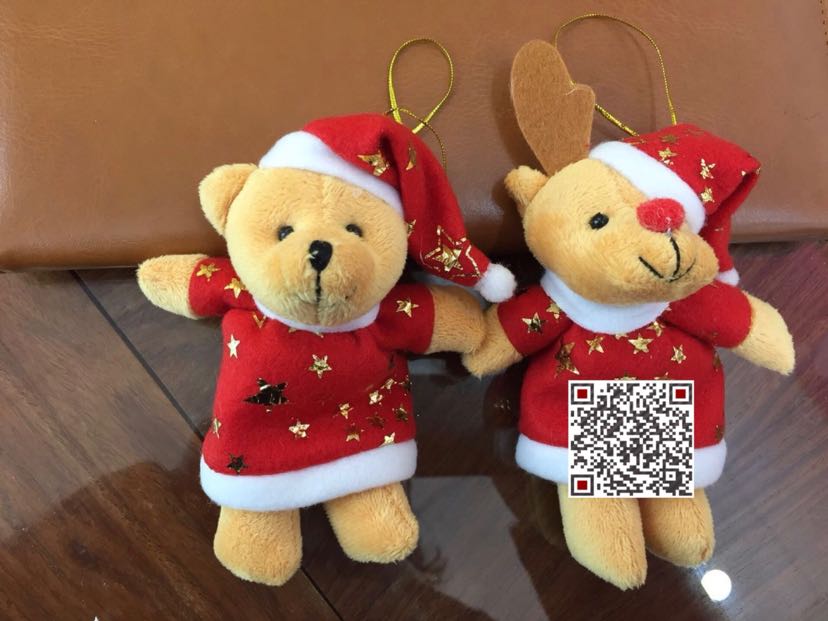 The Christmas tree is decorated with the Santa Claus bear.