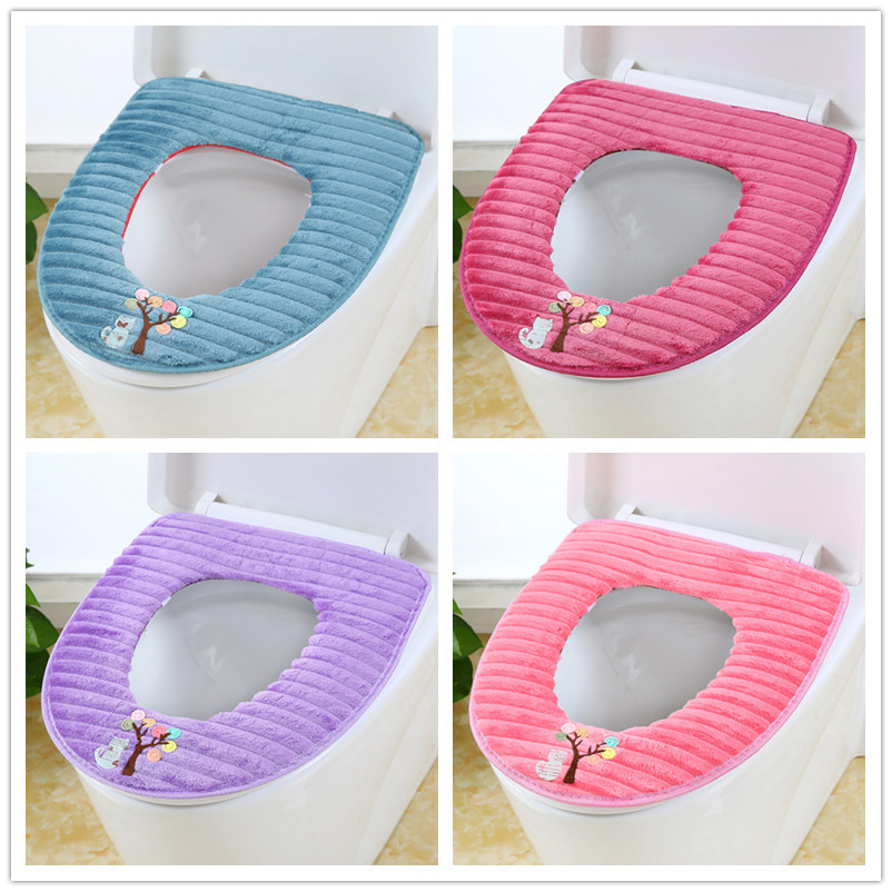 The toilet seat is sitting on the toilet seat, the toilet seat cushion the toilet seat.
